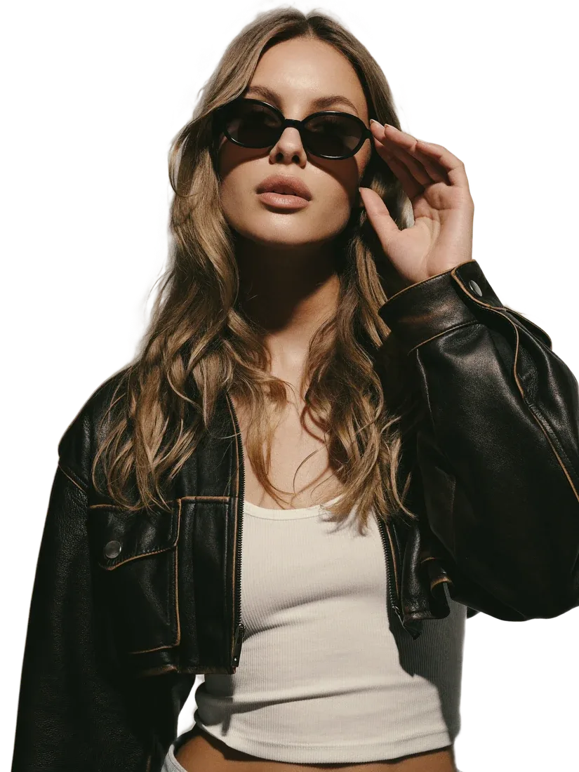 A creator with a pre-loved leather jacket
